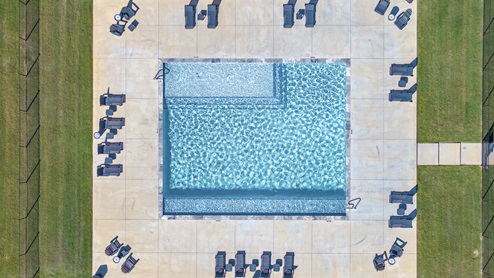 Creeks at Burnett Trail swimming pool with seating
