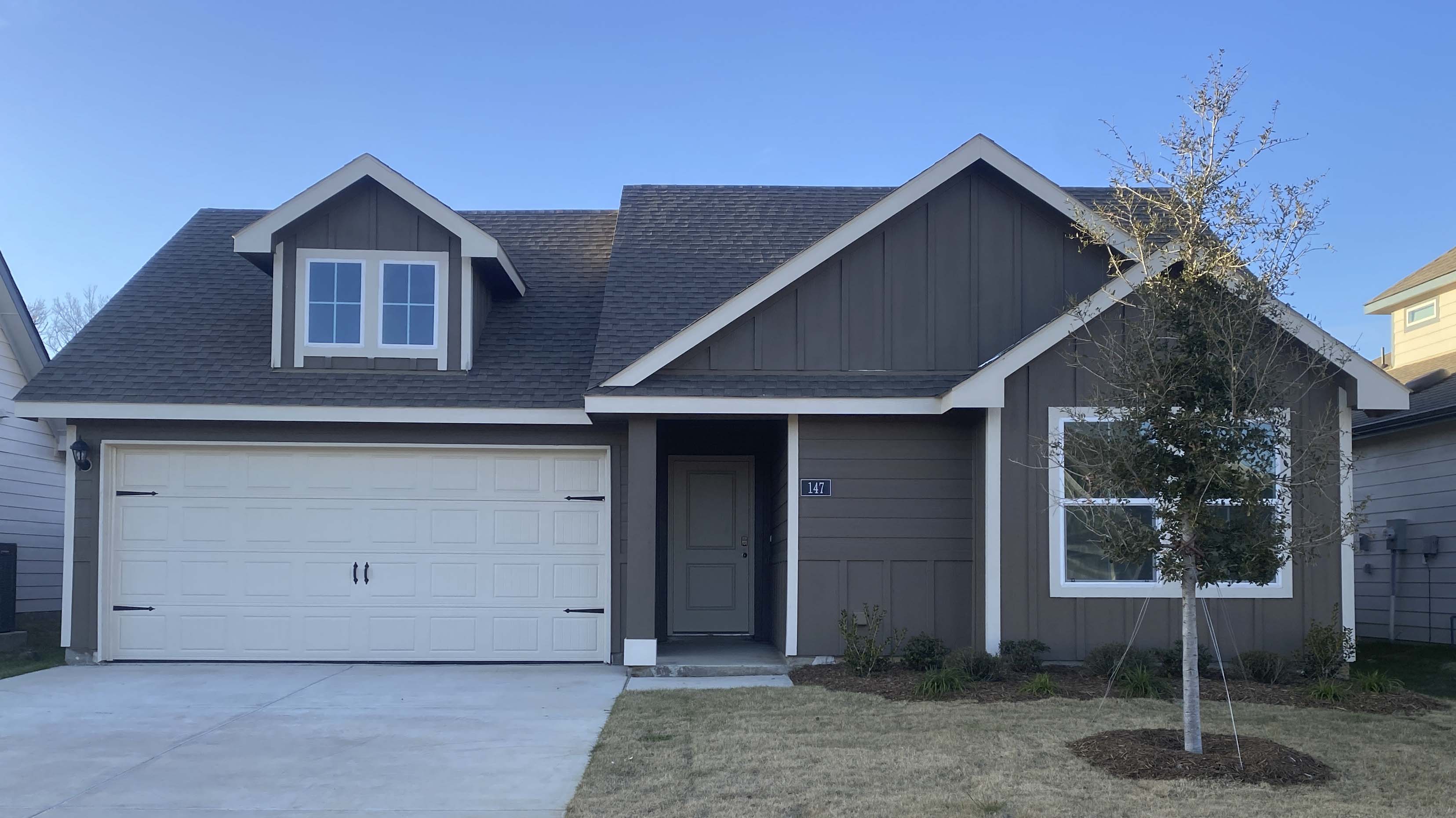 exterior of one story home with siding