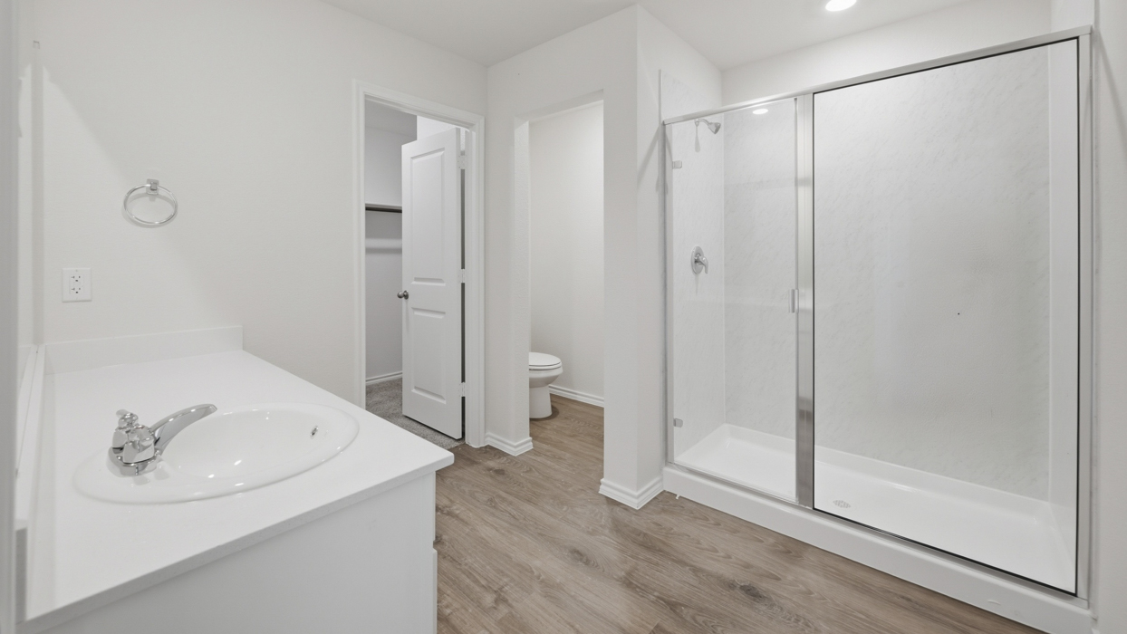 primary bathroom with walk in shower