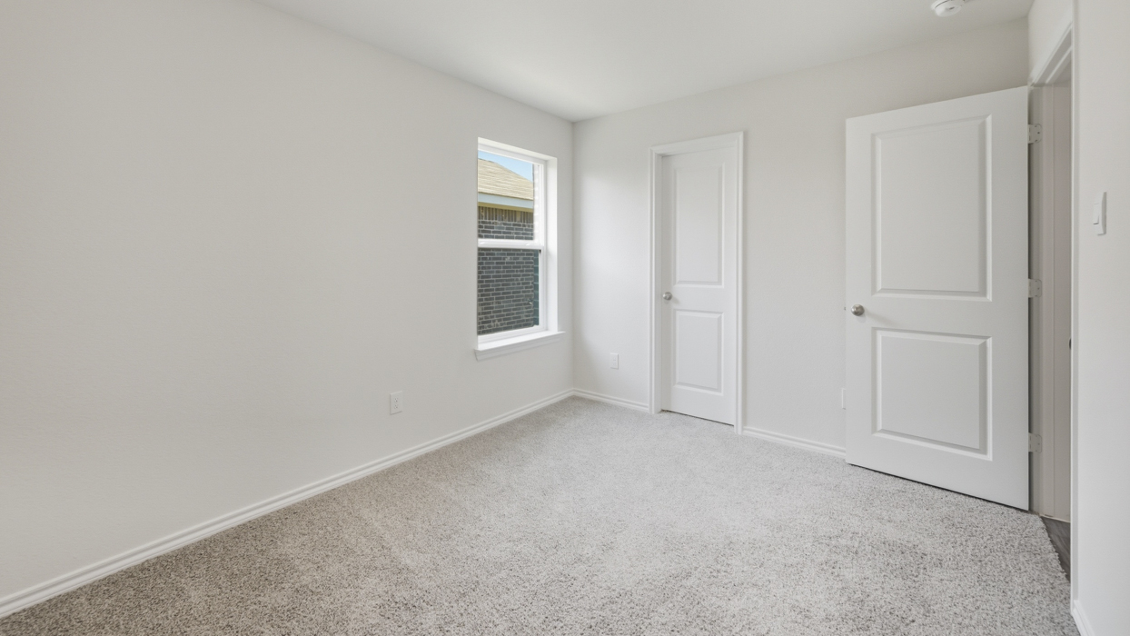bedroom 2 with walk in closet