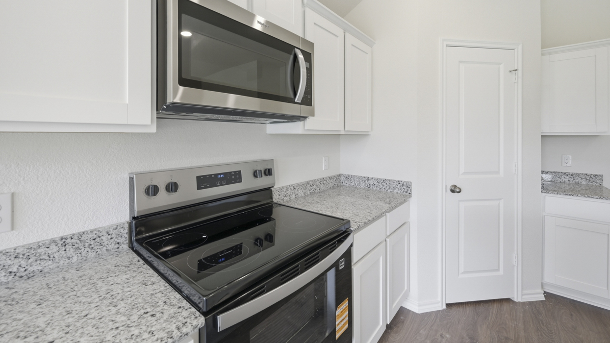 kitchen appliances with electric stove