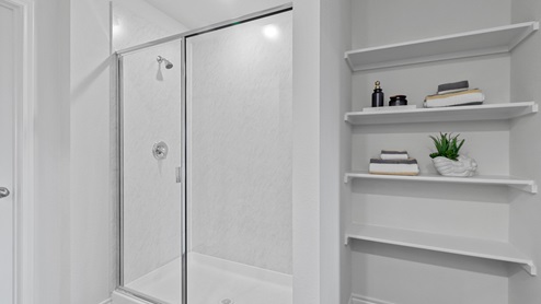 X40J primary bathroom shower and shelves