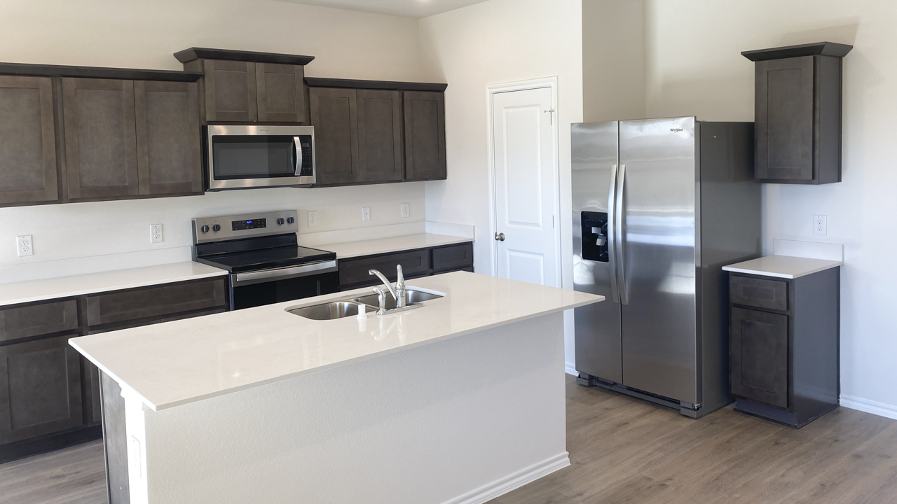 kitchen area with hardwood floors