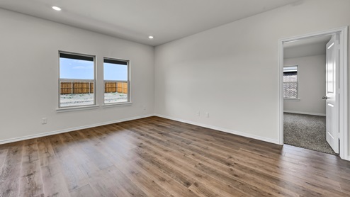 X40A living area with hardwood floors