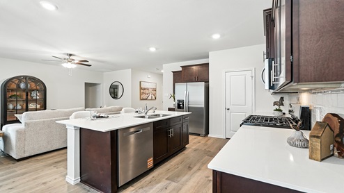 Kitchen with stainless steel appliances.