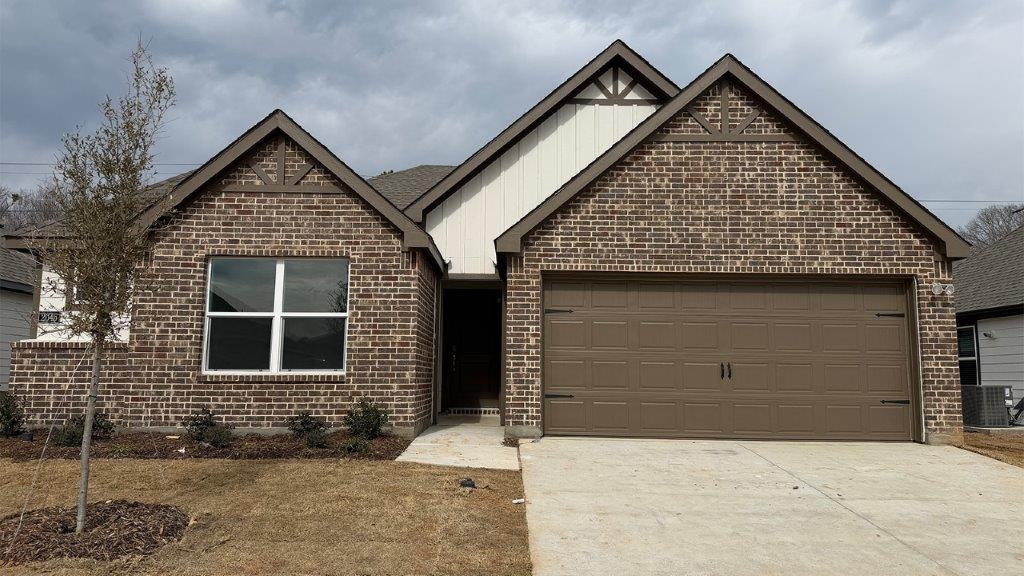 exterior of single story home with 2 car garage