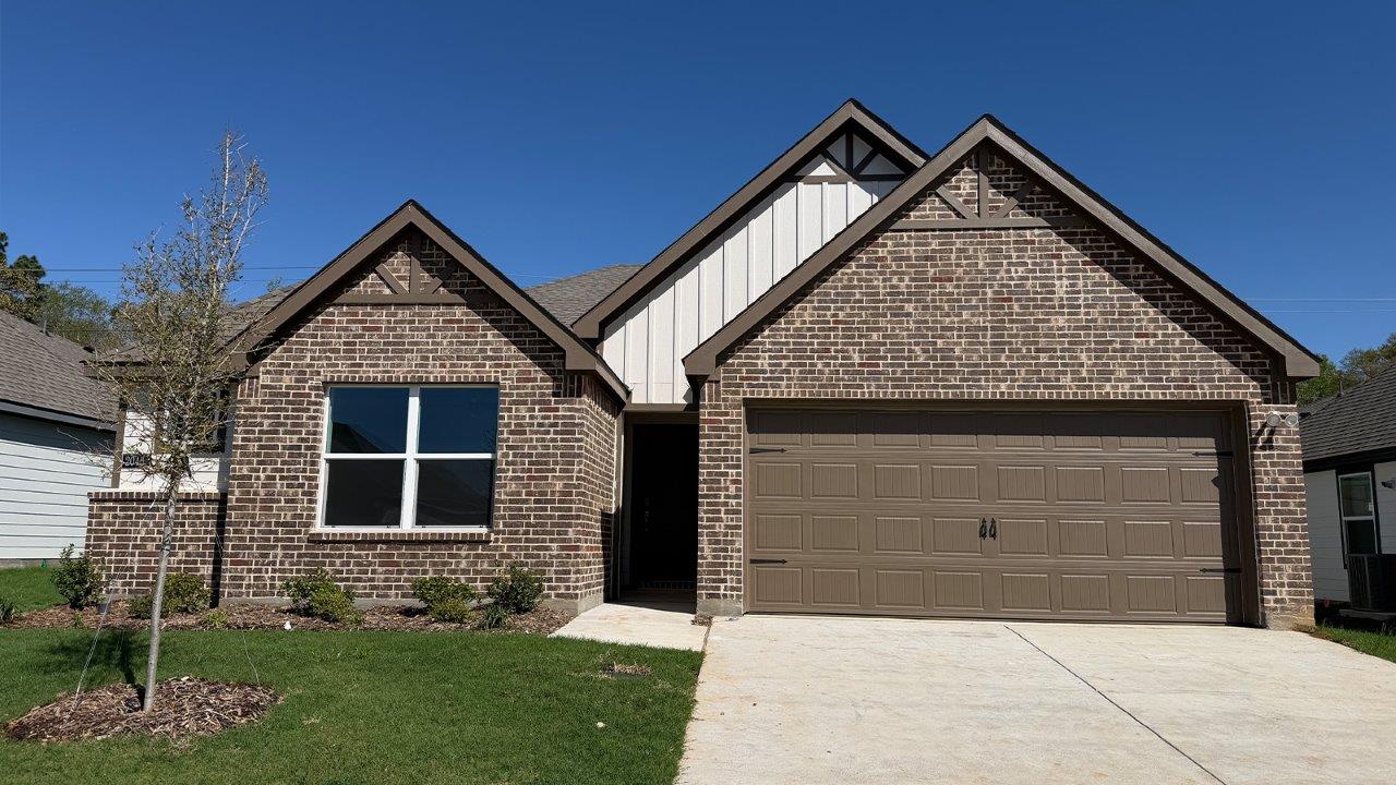exterior of single story home with 2 car garage