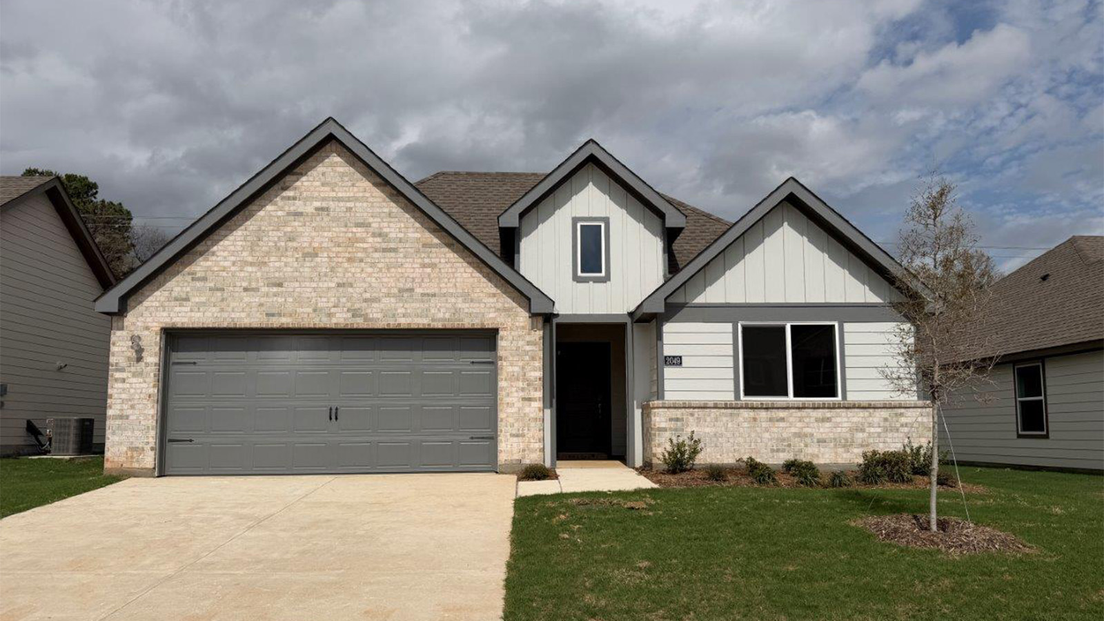 single story home with 2 car garage