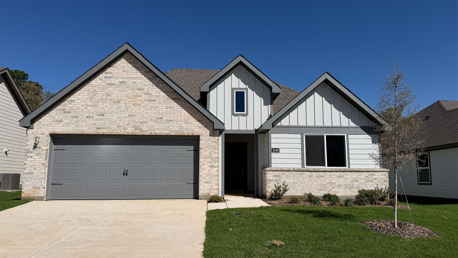 single story home with 2 car garage