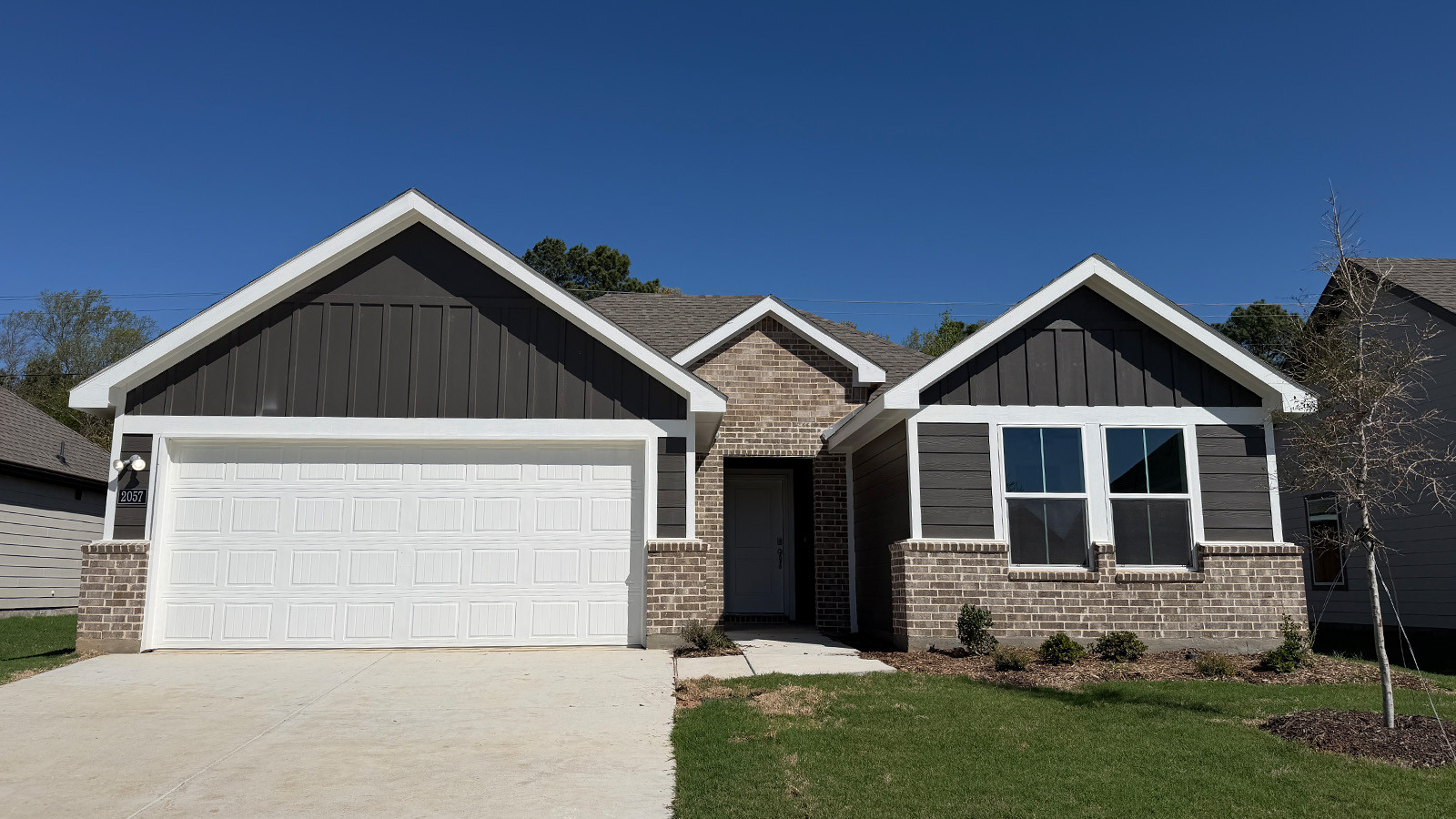 single story home with 2 car garage