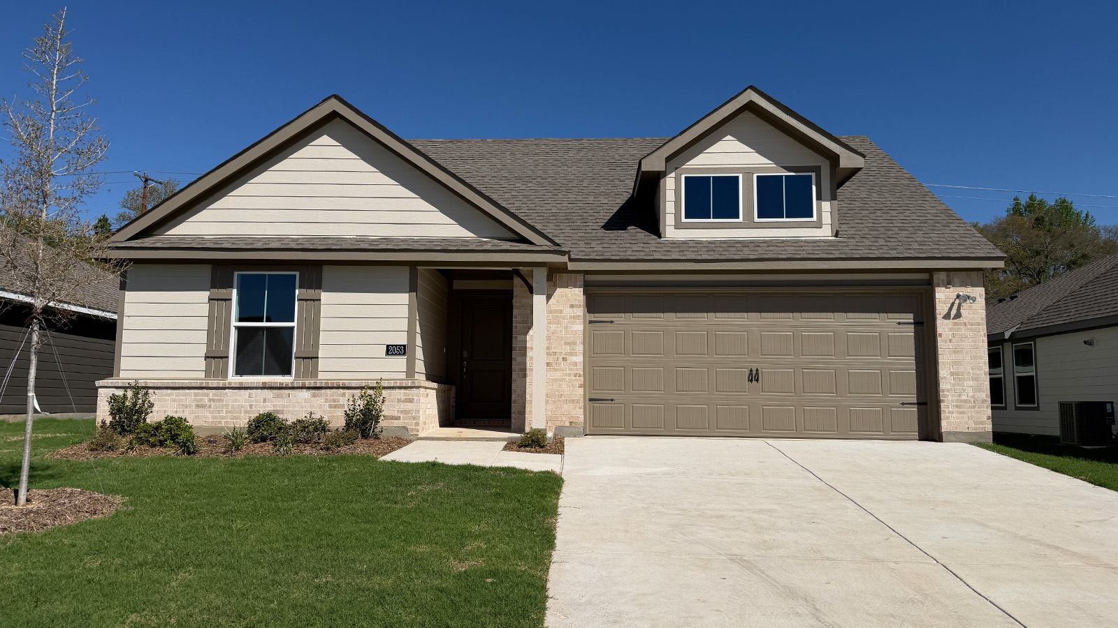 single story home with 2 car garage