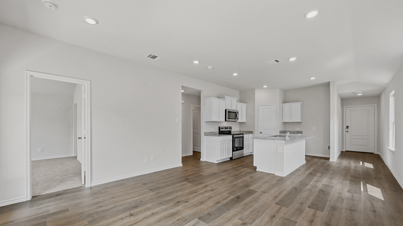 large open concept living area overlooking kitchen