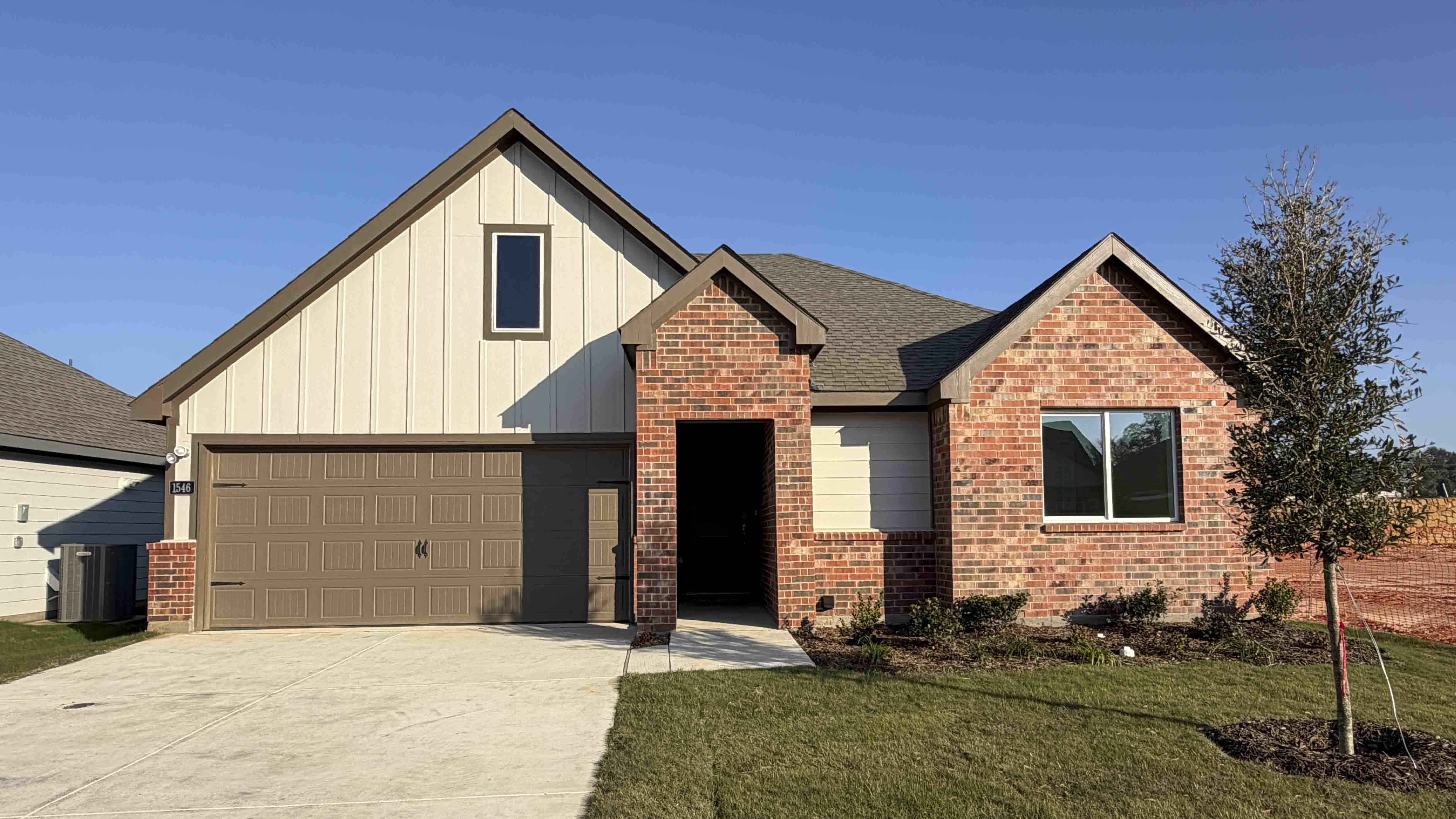 exterior of home with brick and siding