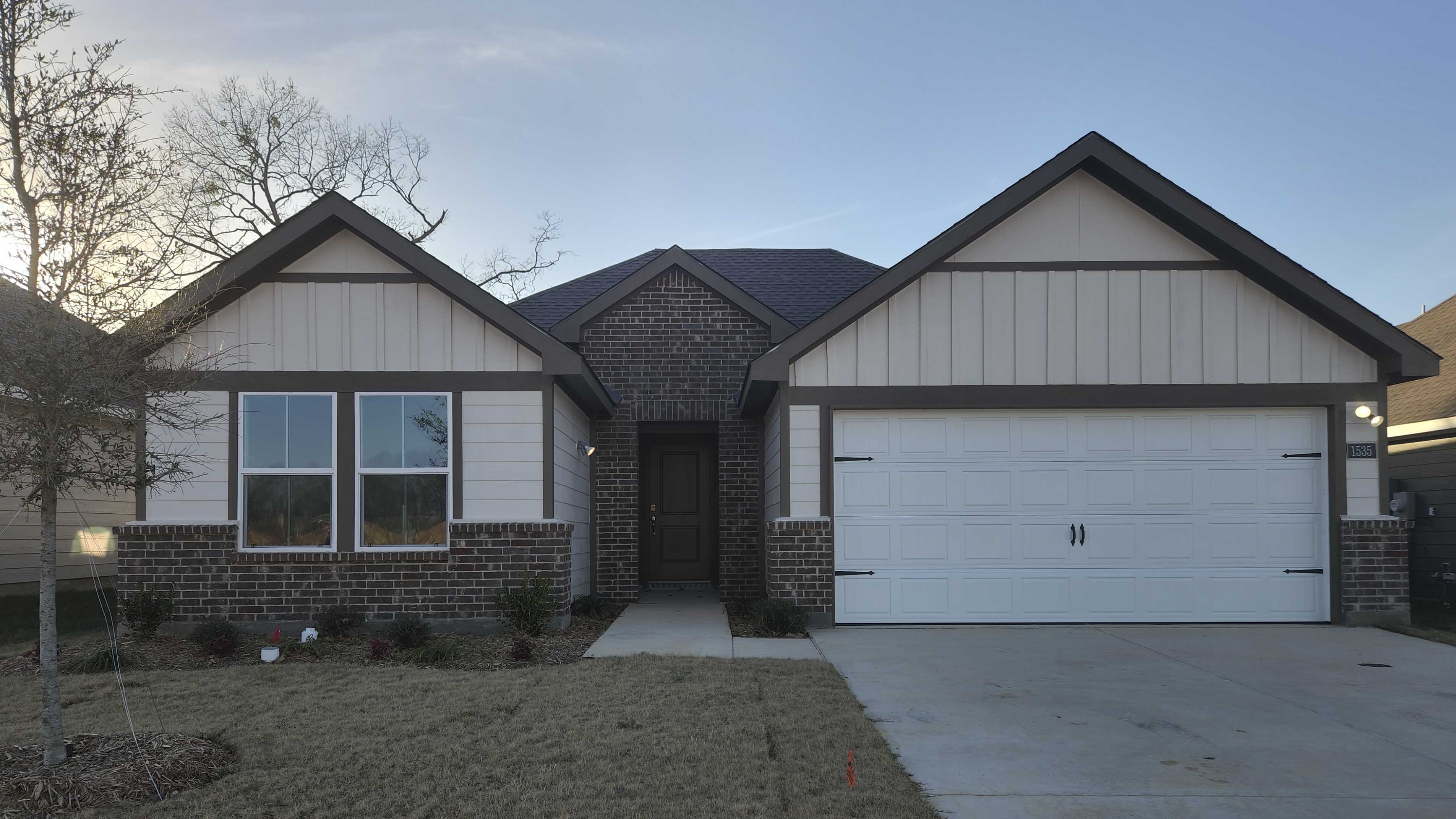 exterior of one story home with siding