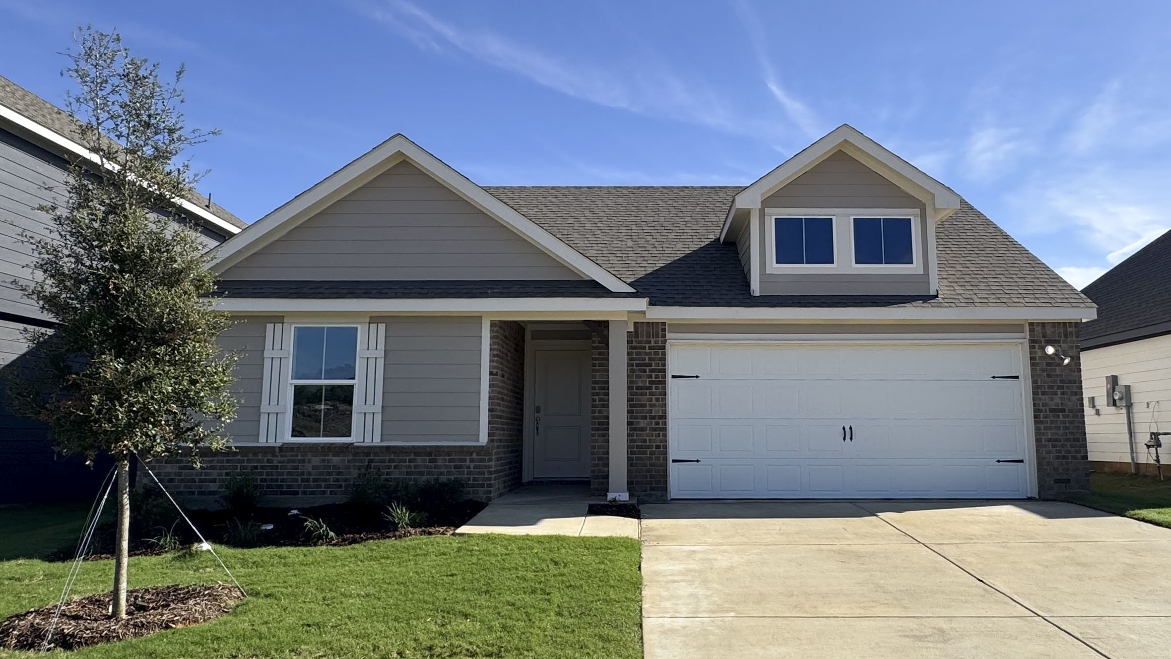 exterior of one story home with siding