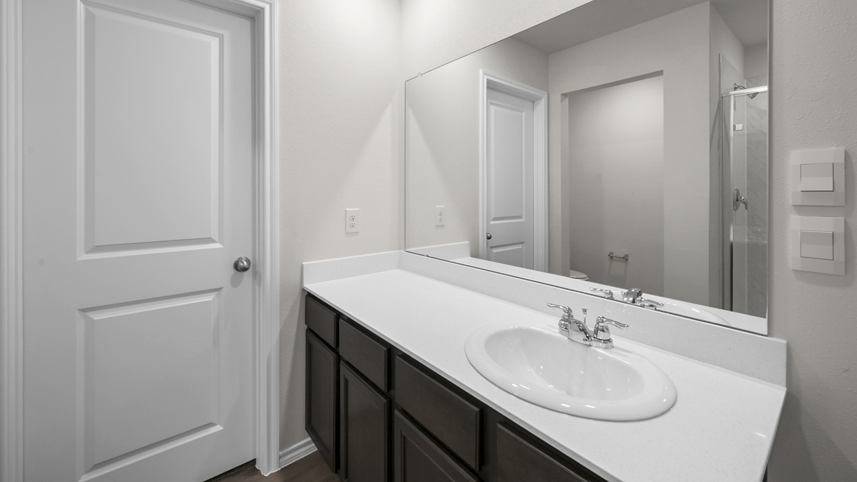 primary bathroom with single sink