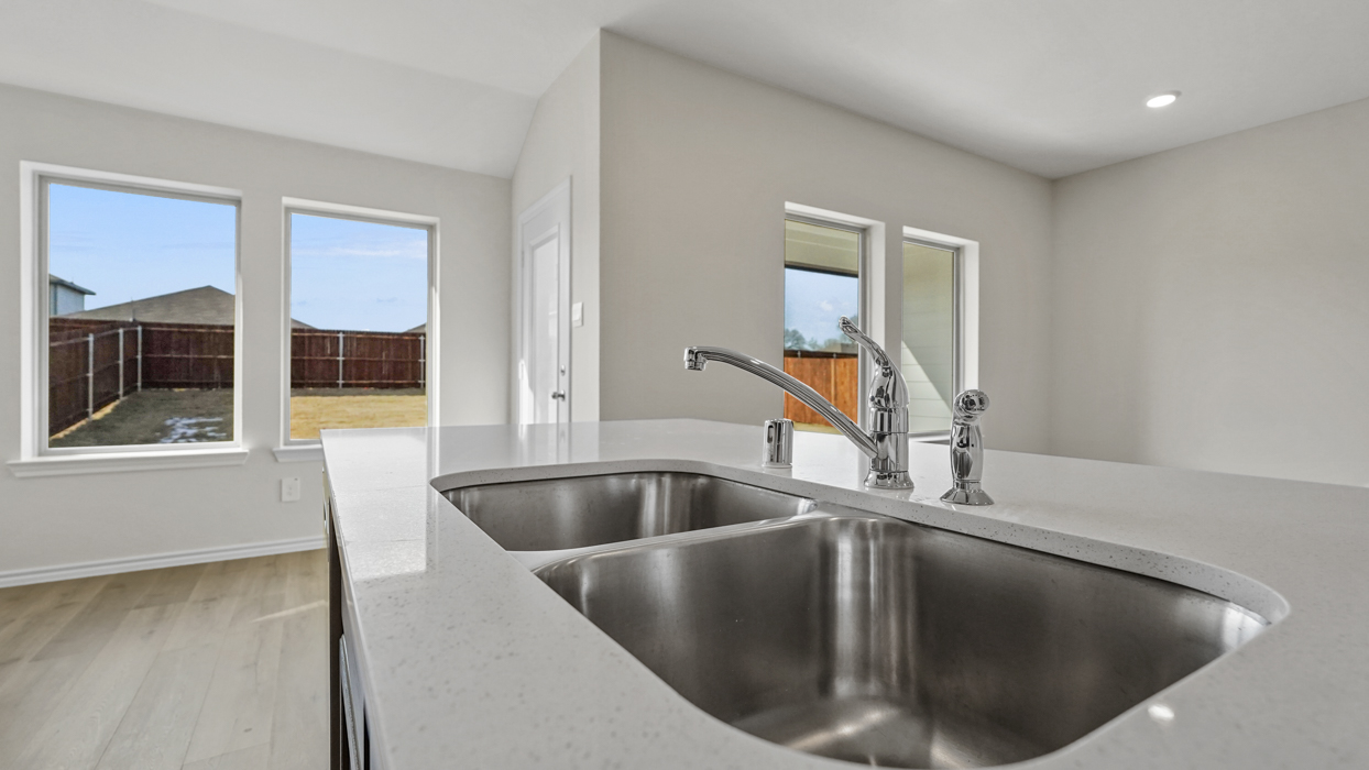 a kitchen sink in an island