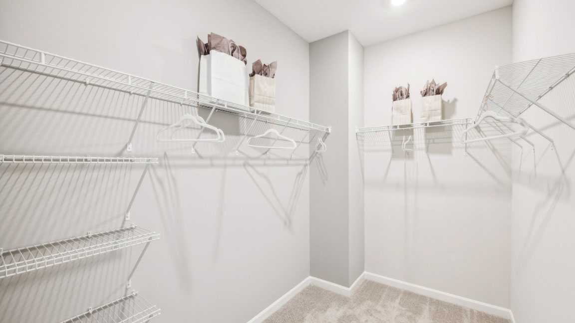 Walk-in closet in primary suite