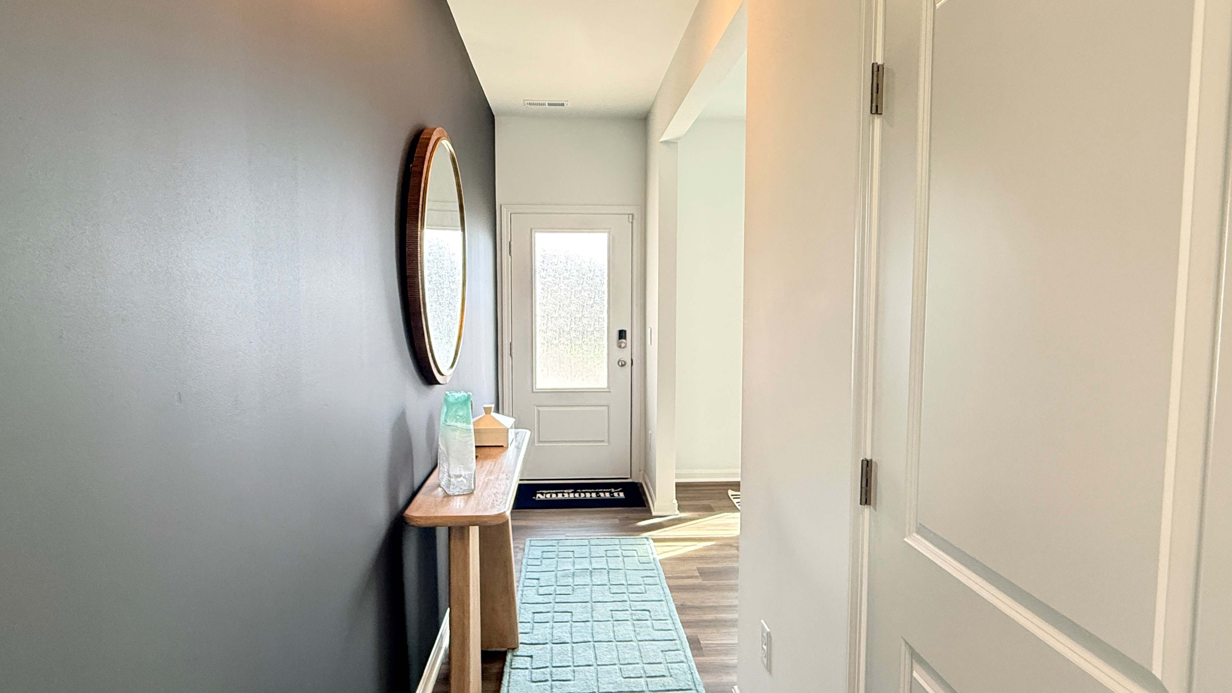 First floor foyer looking towards the front door.