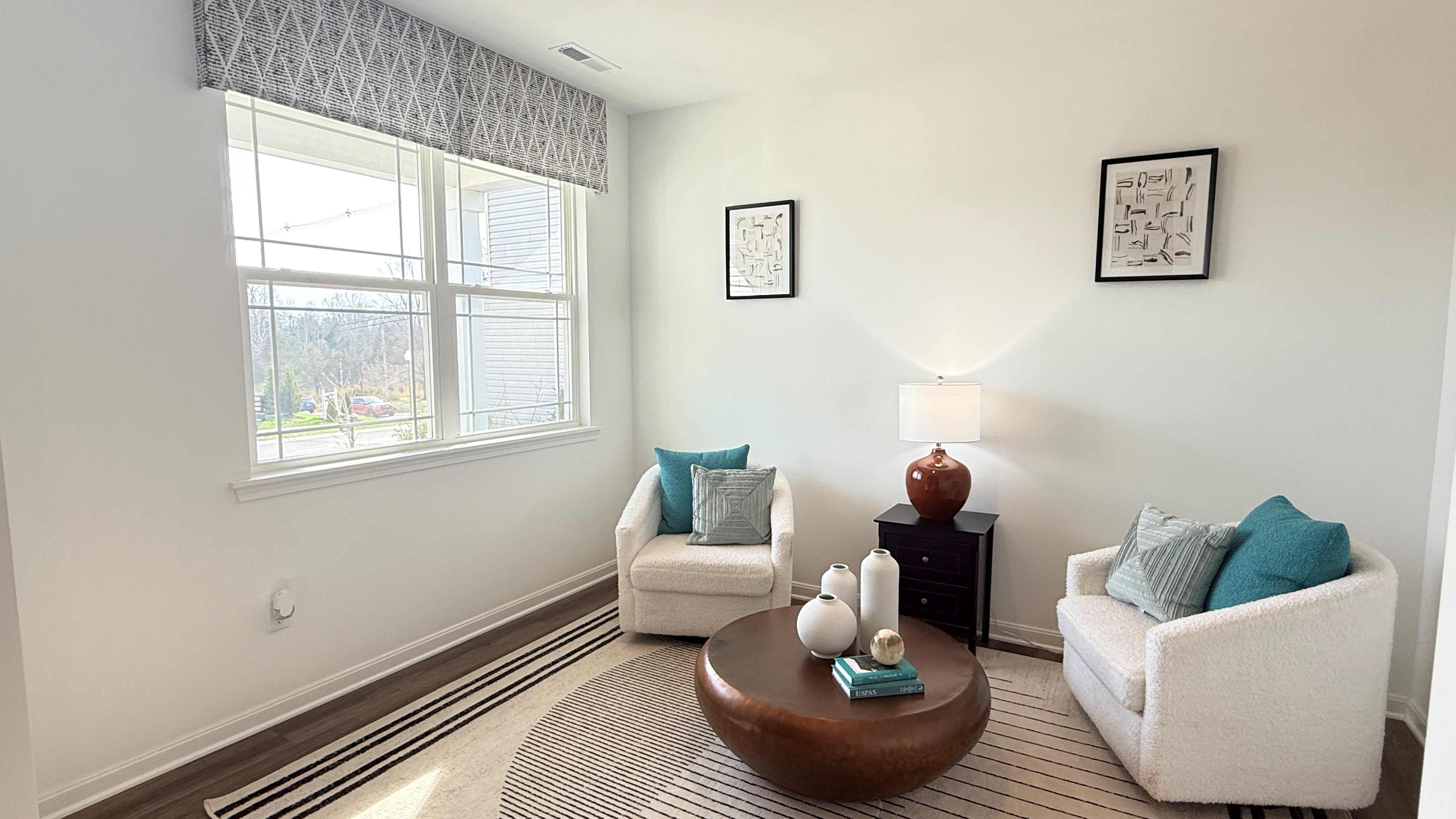 Other view of flex room with double window overlooking the front yard.