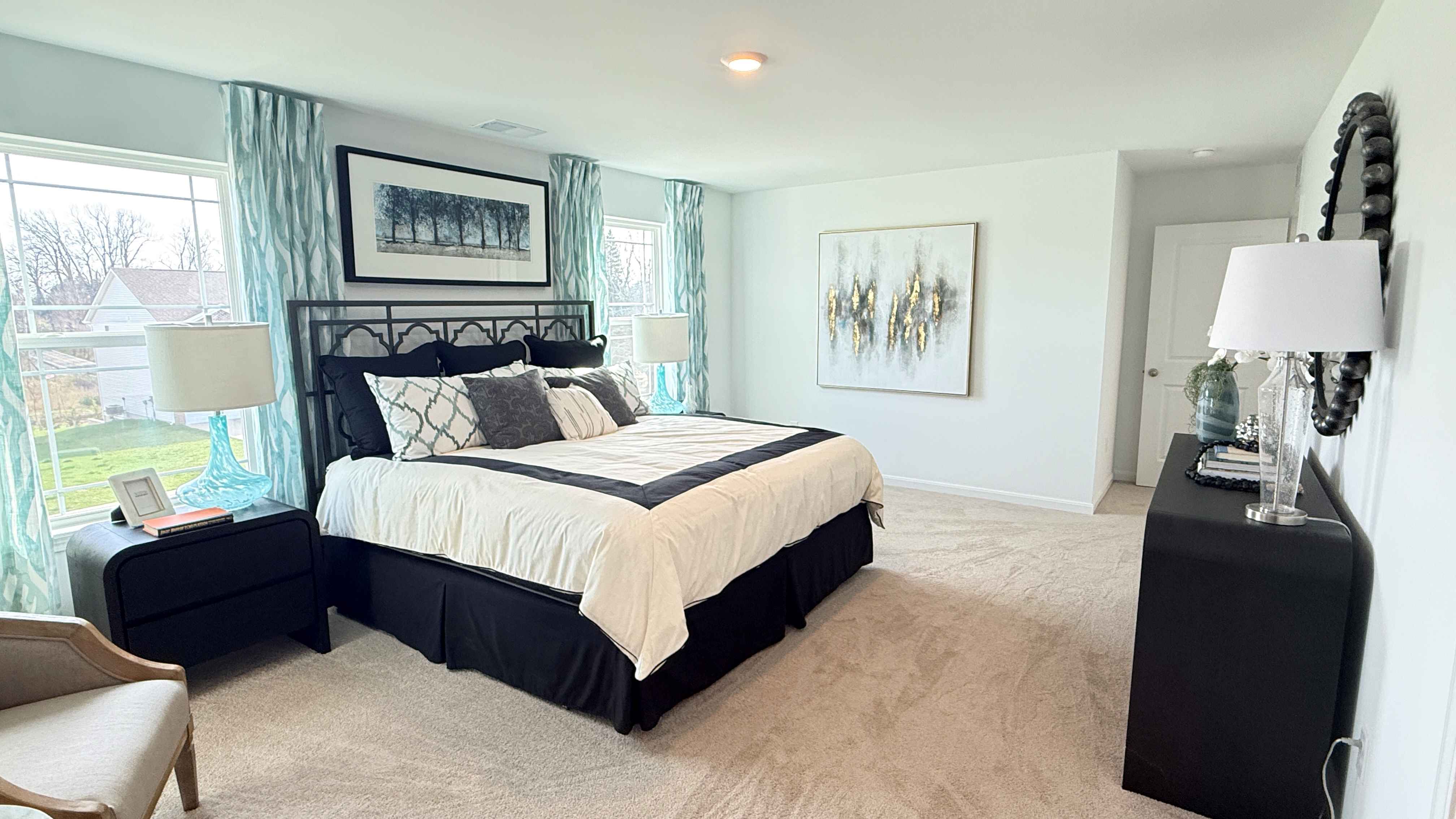 Other view of primary bedroom.