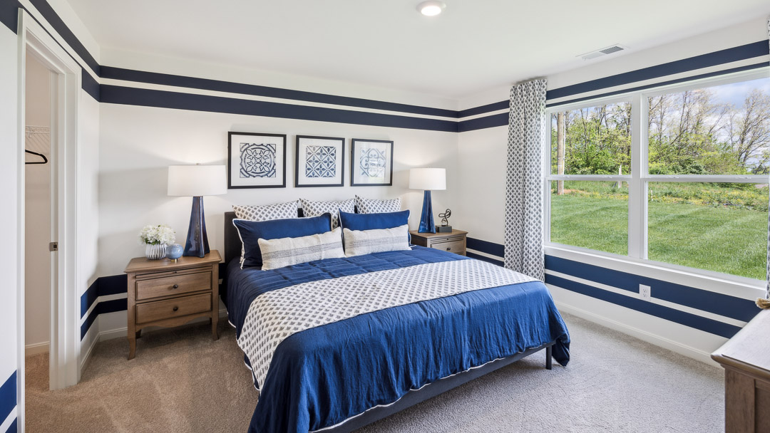 primary bedroom with king size bed and two nightstands