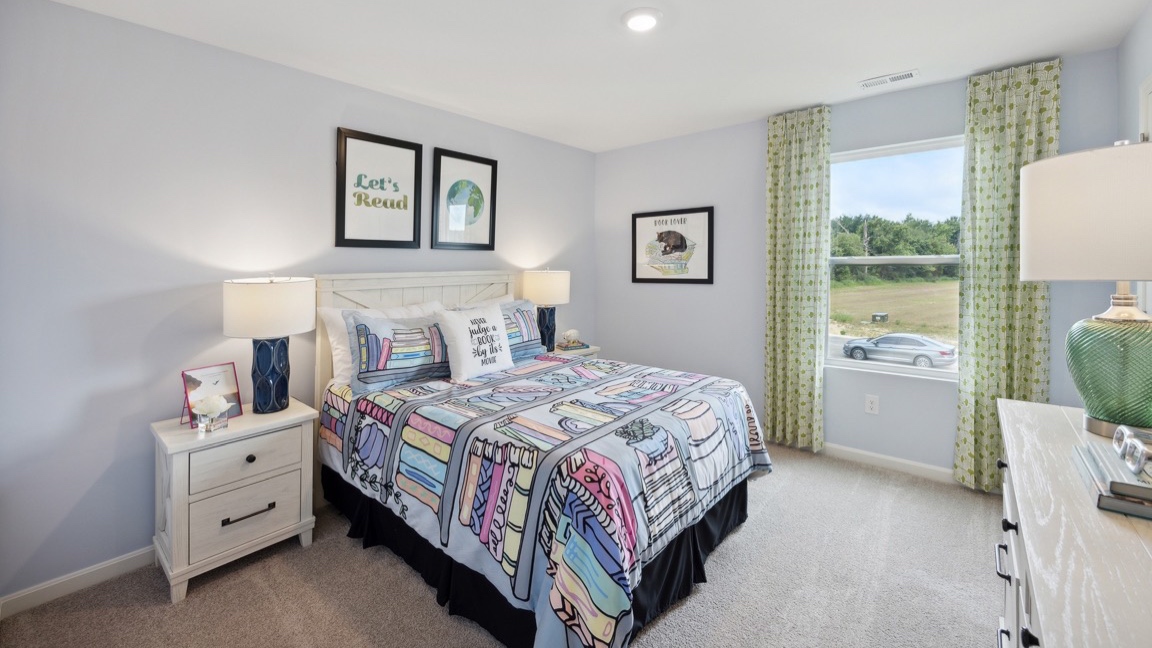 Other view of spare bedroom with single window, bed, dresser, and 2 nightstands.