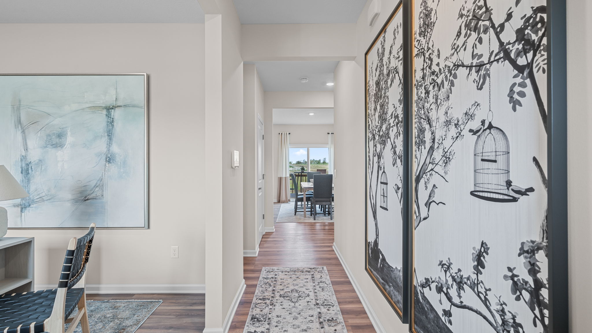 Foyer with flex room opening to the side.