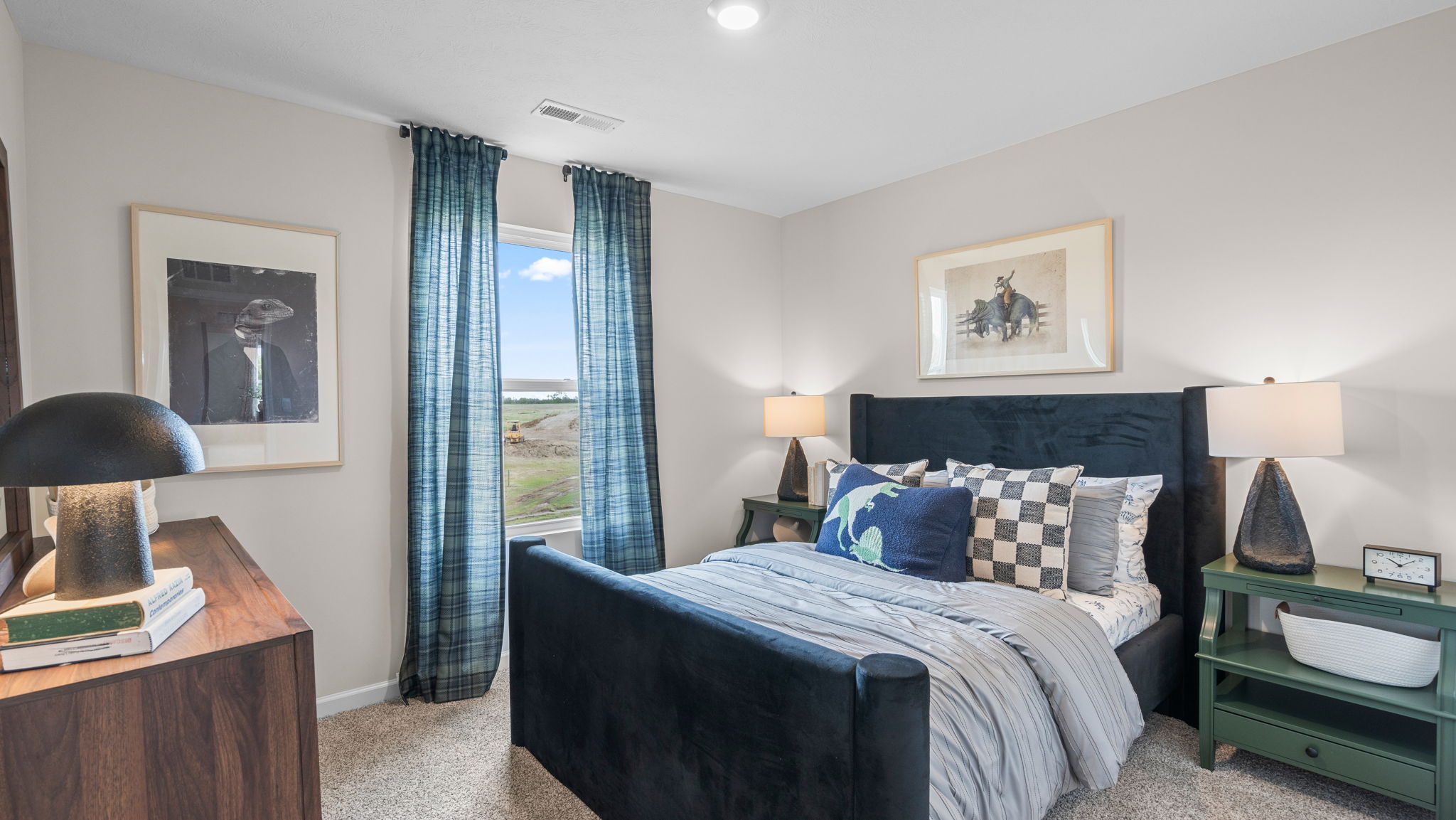 Spare bedroom #3 with large bed, 2 nightstands, dresser, and single window.
