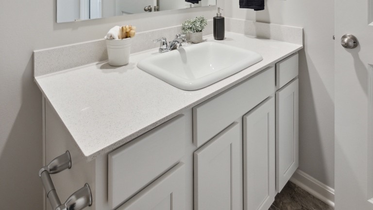 Large single vanity with mirror above