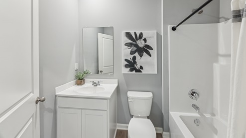 Interior bathroom with full-sized shower and sink