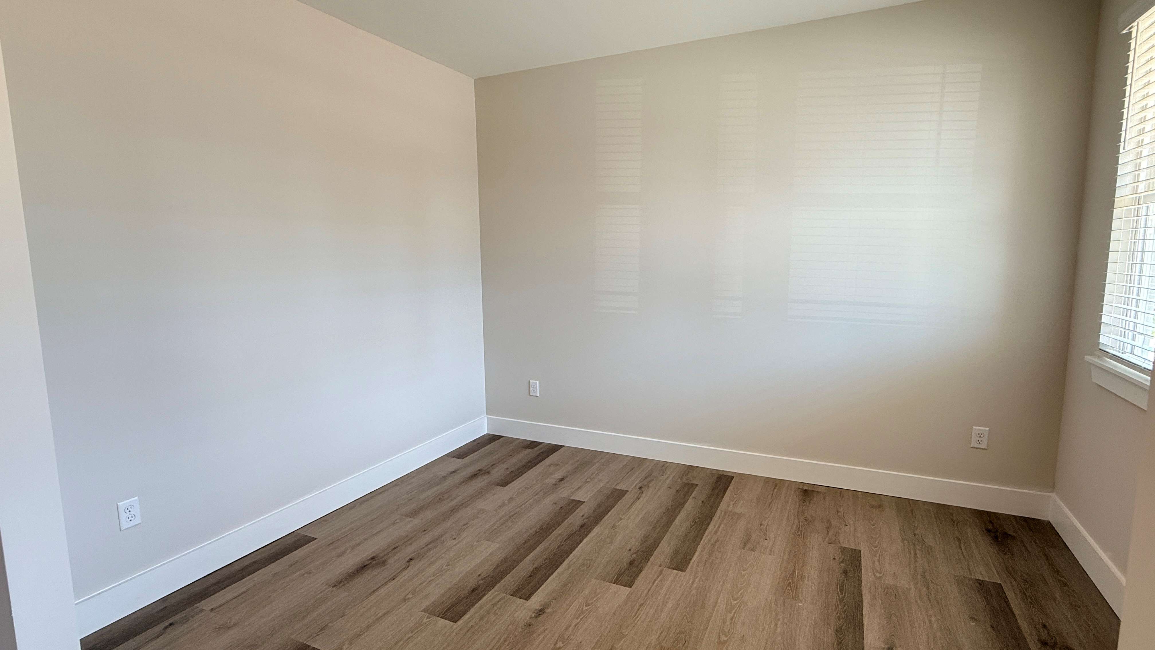 Other view of flex room with luxury vinyl plank flooring.