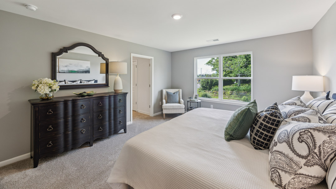 Interior bedroom with large window