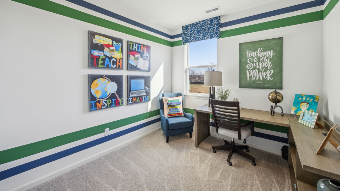 home office feature a corner desk, decorated with blue and green stripes on the wall