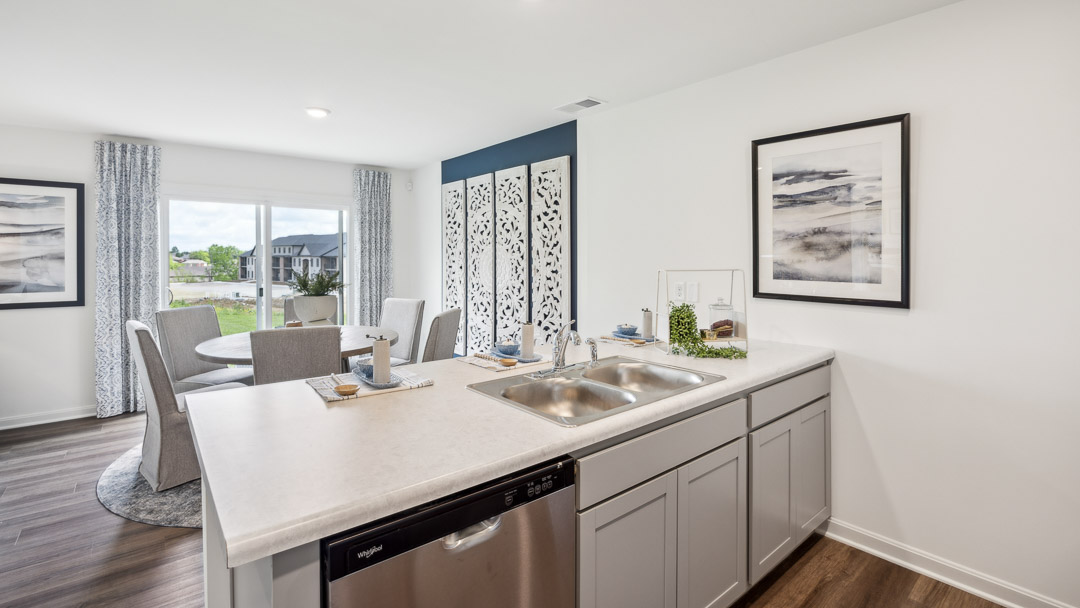Interior kitchen with island open to living area