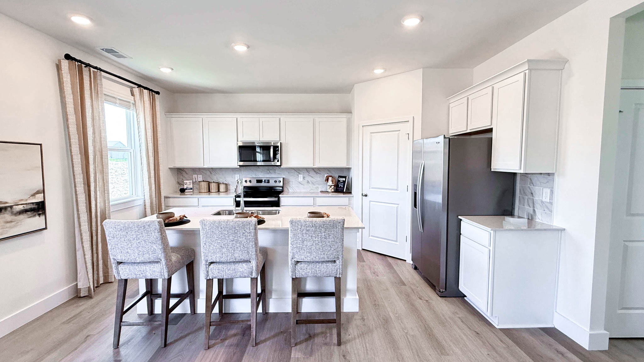 Kitchen with fridge to the right