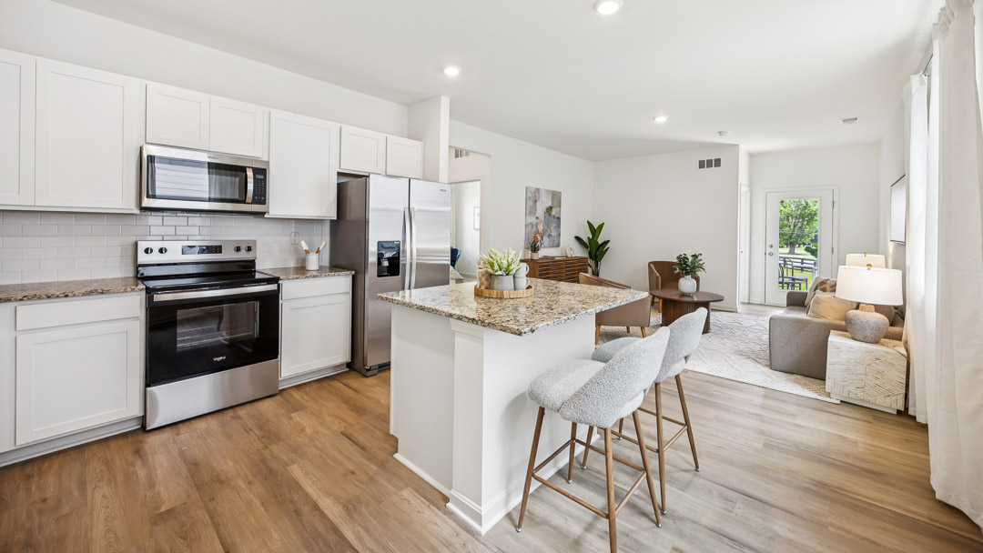 Kitchen with stainless steel appliances and island