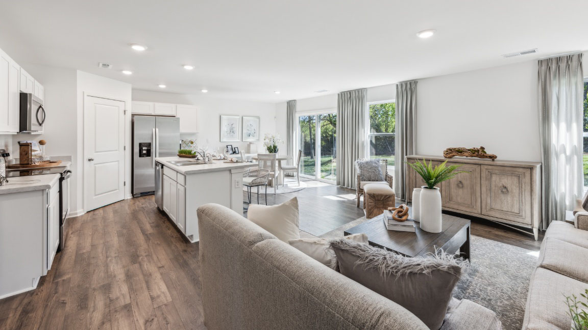 Living room, dining area, and kitchen.