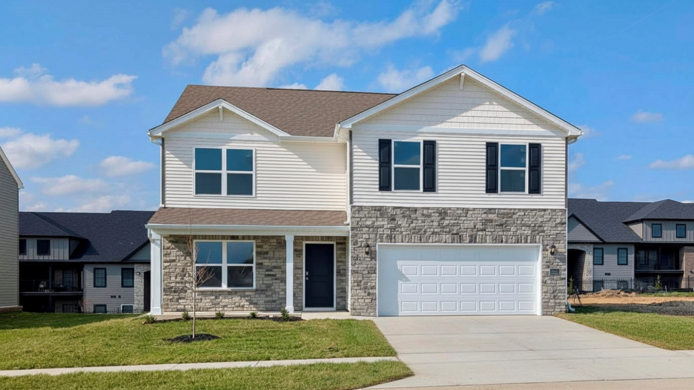 Move-in ready Henley floorplan with covered front porch and 2 car attached garage. Linen colored siding with stone accent along the lower porch of the front of the house.