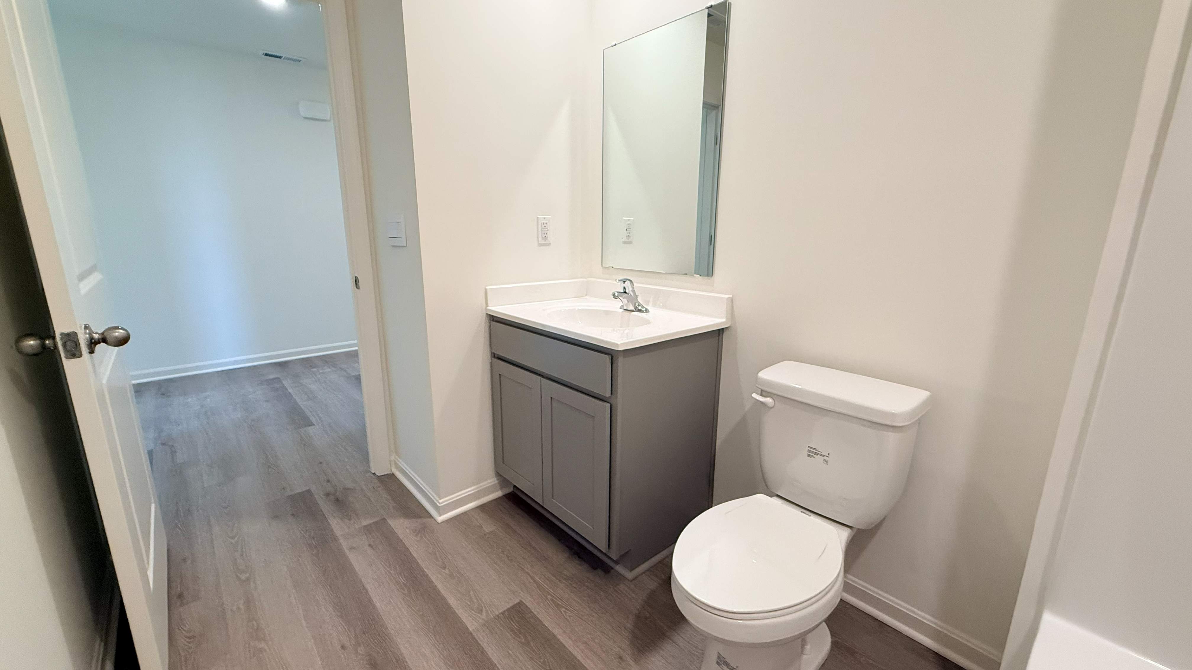 Other view of shared hall bathroom.