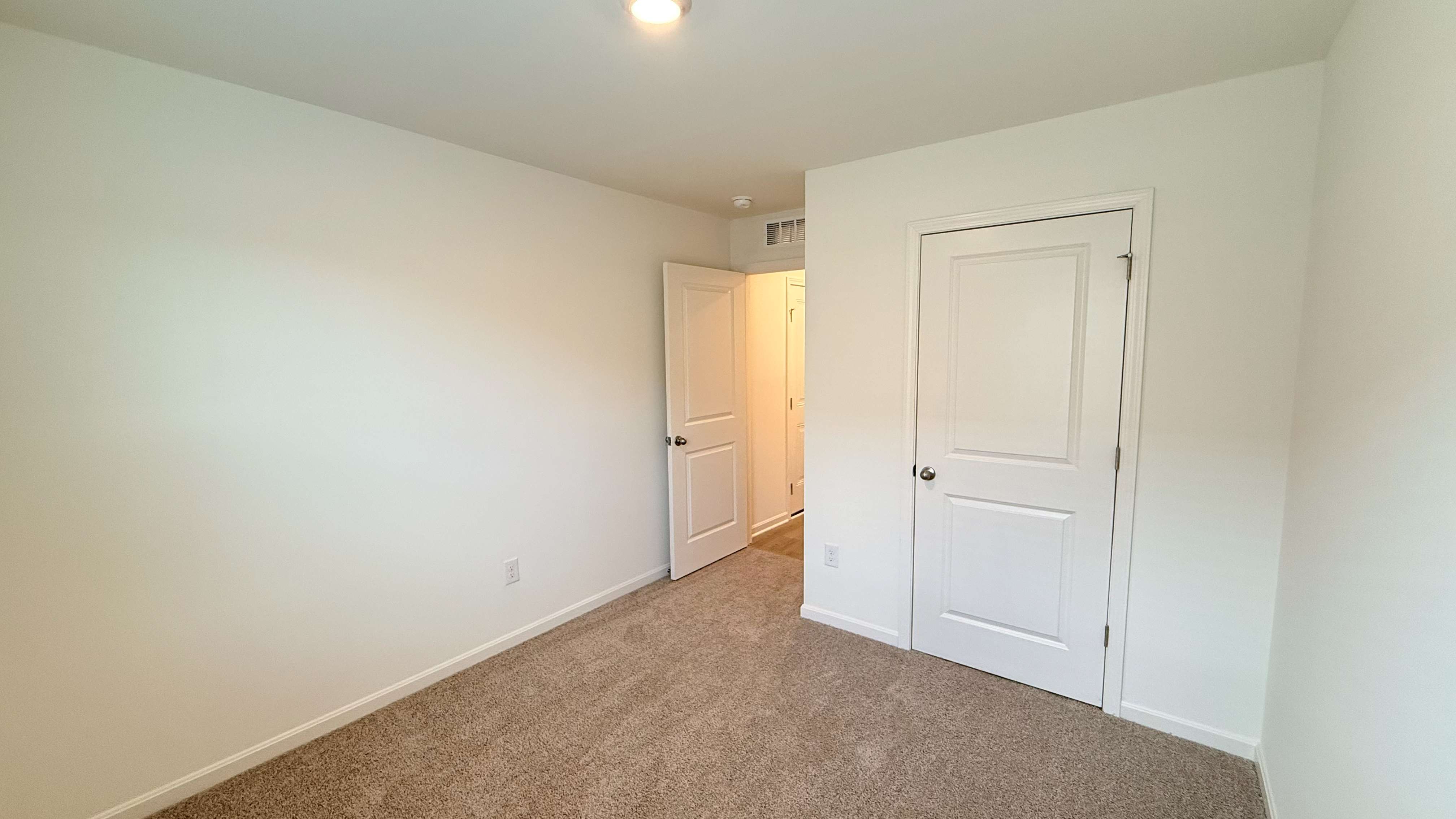 Other view of spare bedroom #4 and closet door.