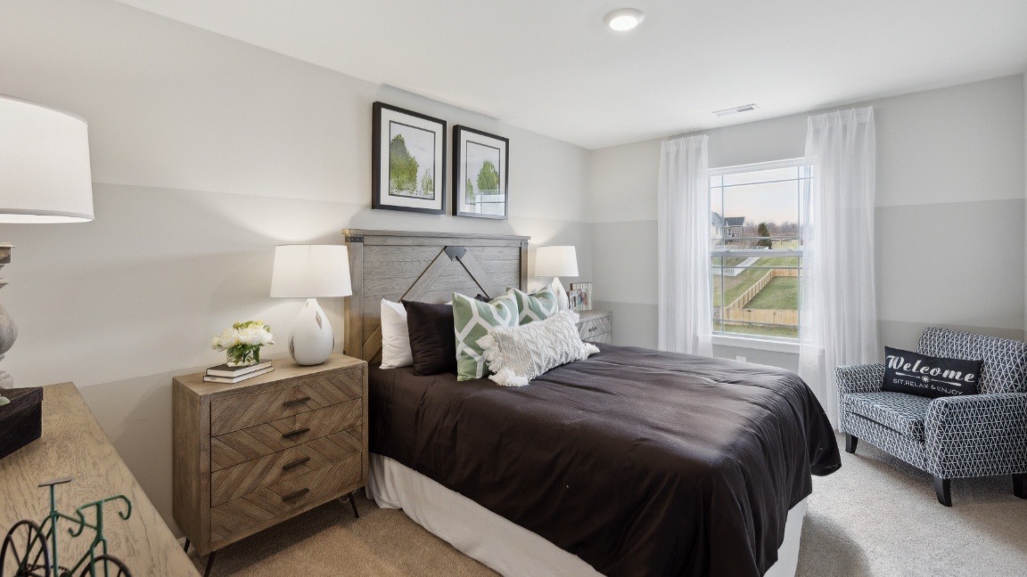 Bedroom with window for natural lighting.