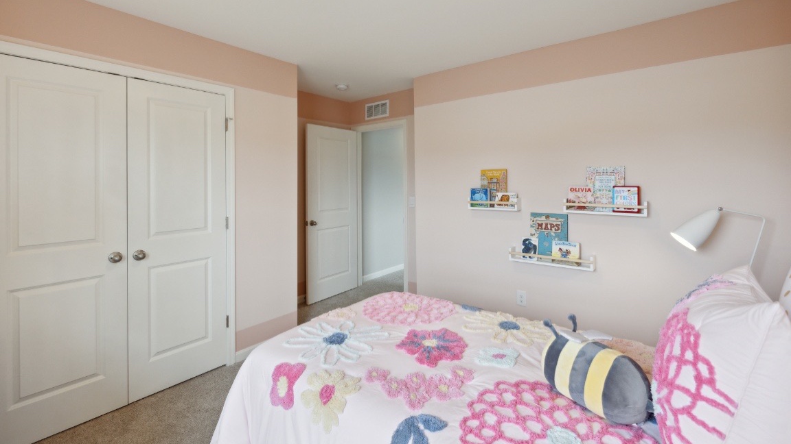 Bedroom with double door closet.