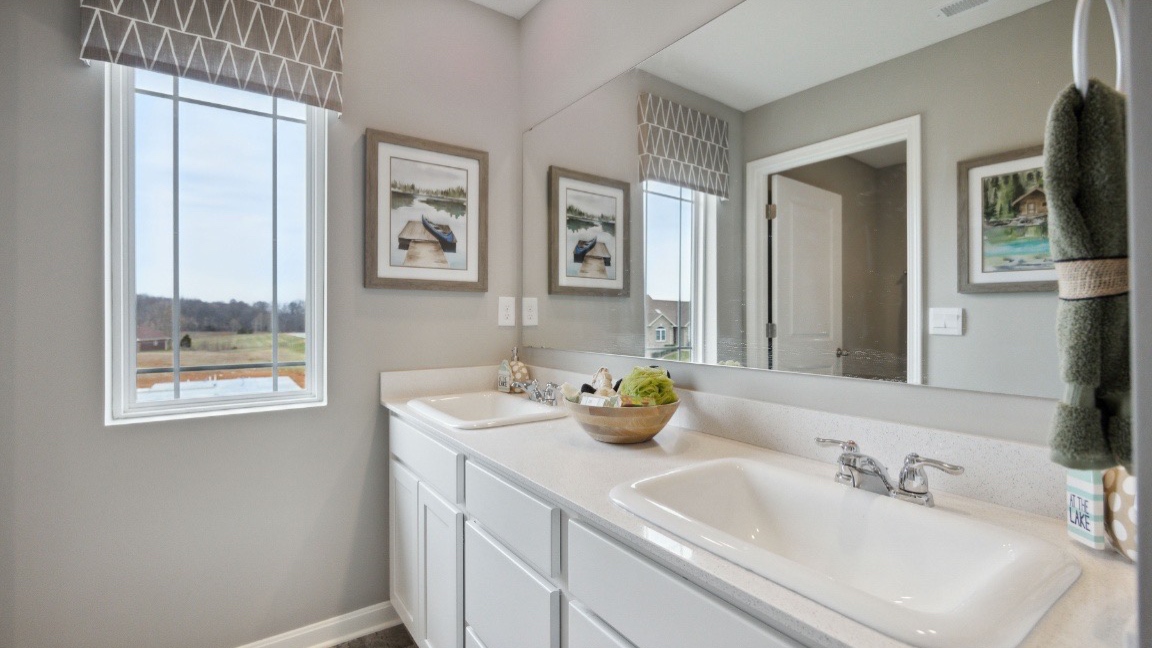 Bathroom with double vanity sink.