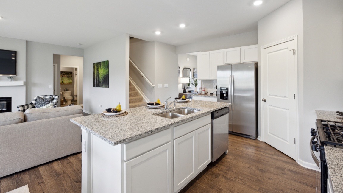 Open kitchen with view of living room.