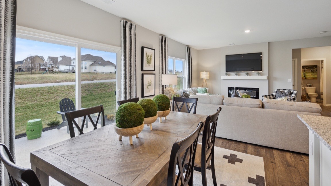 Dining room with direct access to back yard with glass sliding doors.