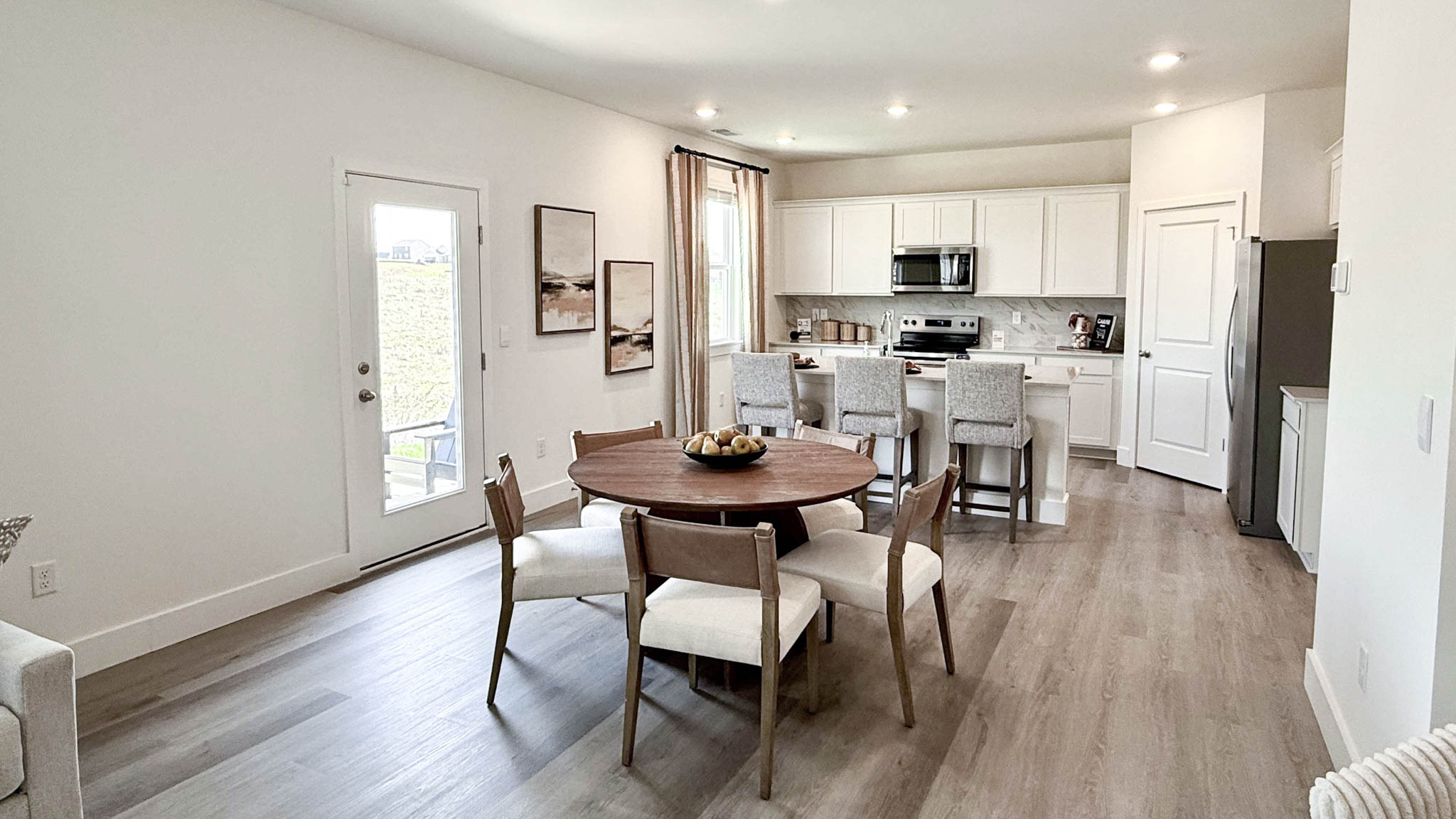 dining room with round table and four chairs