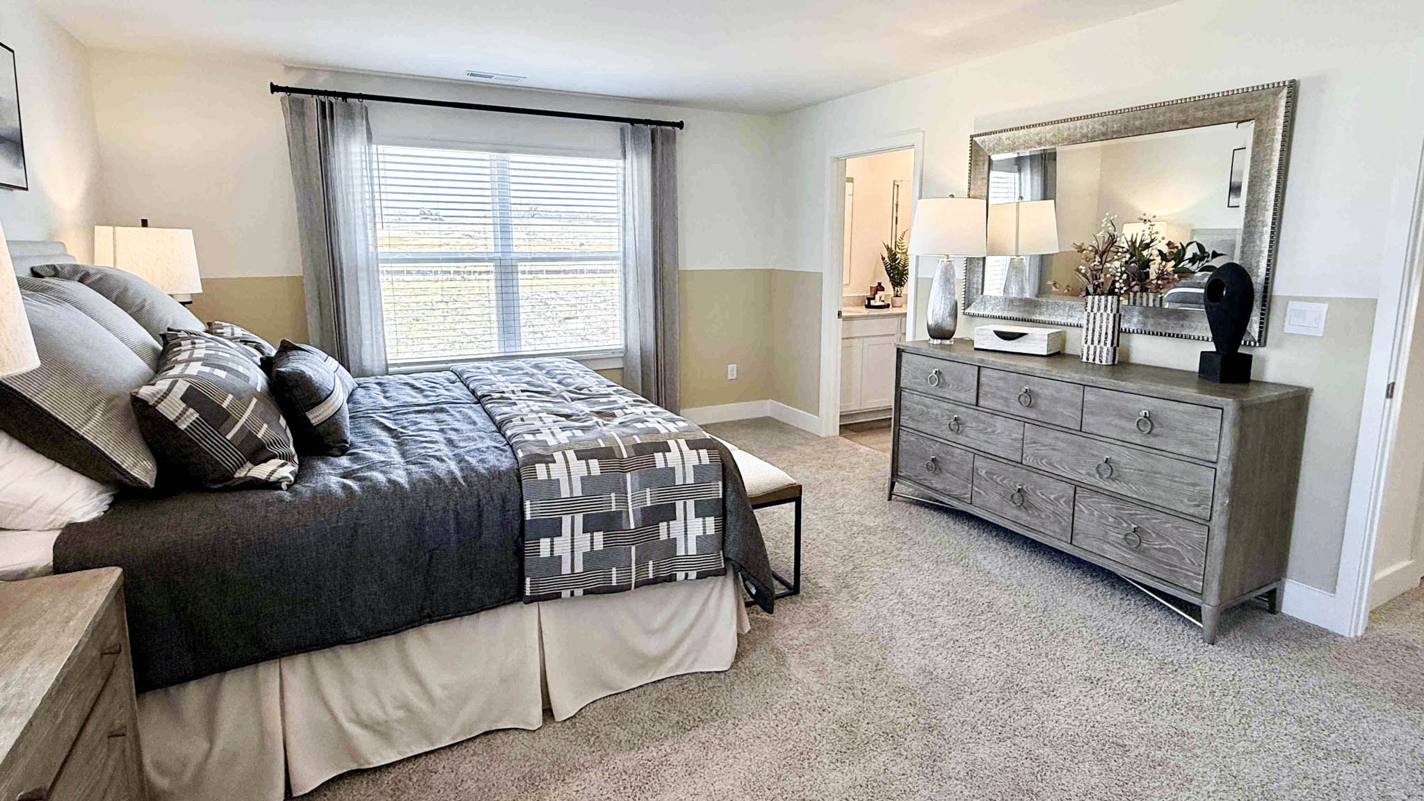 primary bedroom with dresser