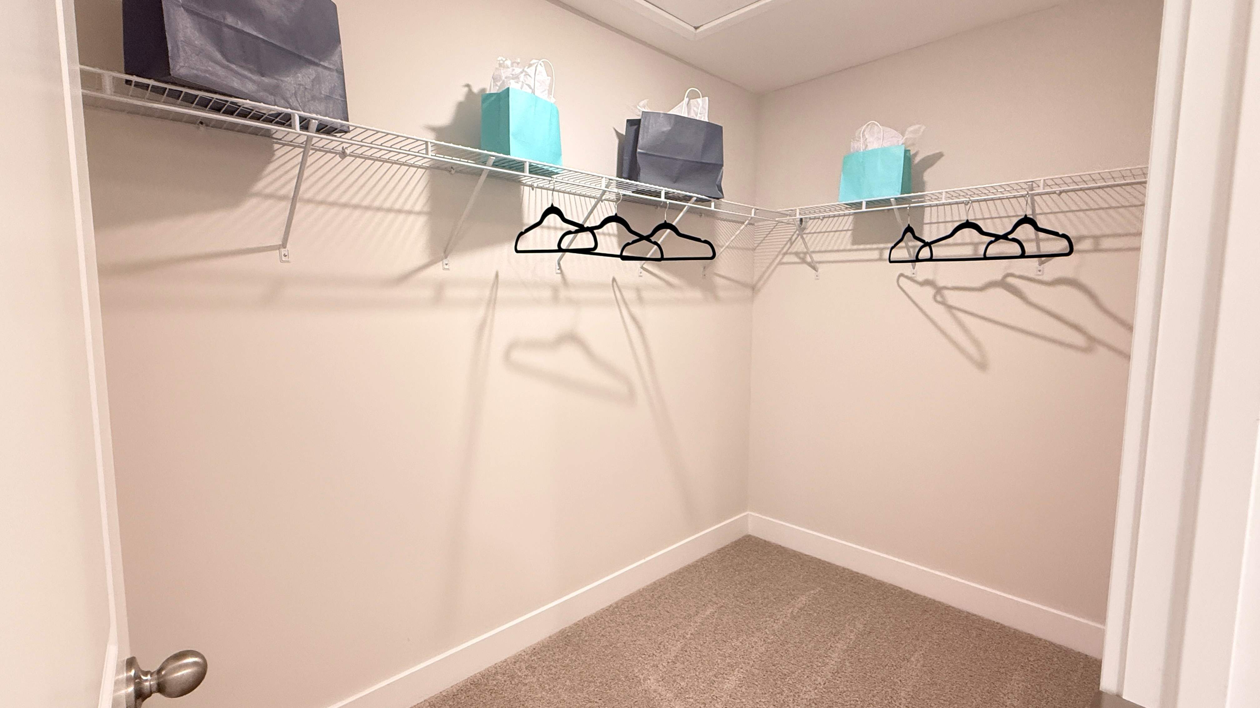 Walk-in closet in the primary