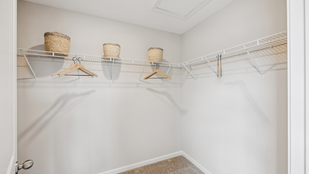 Primary bathroom walk-in closet.
